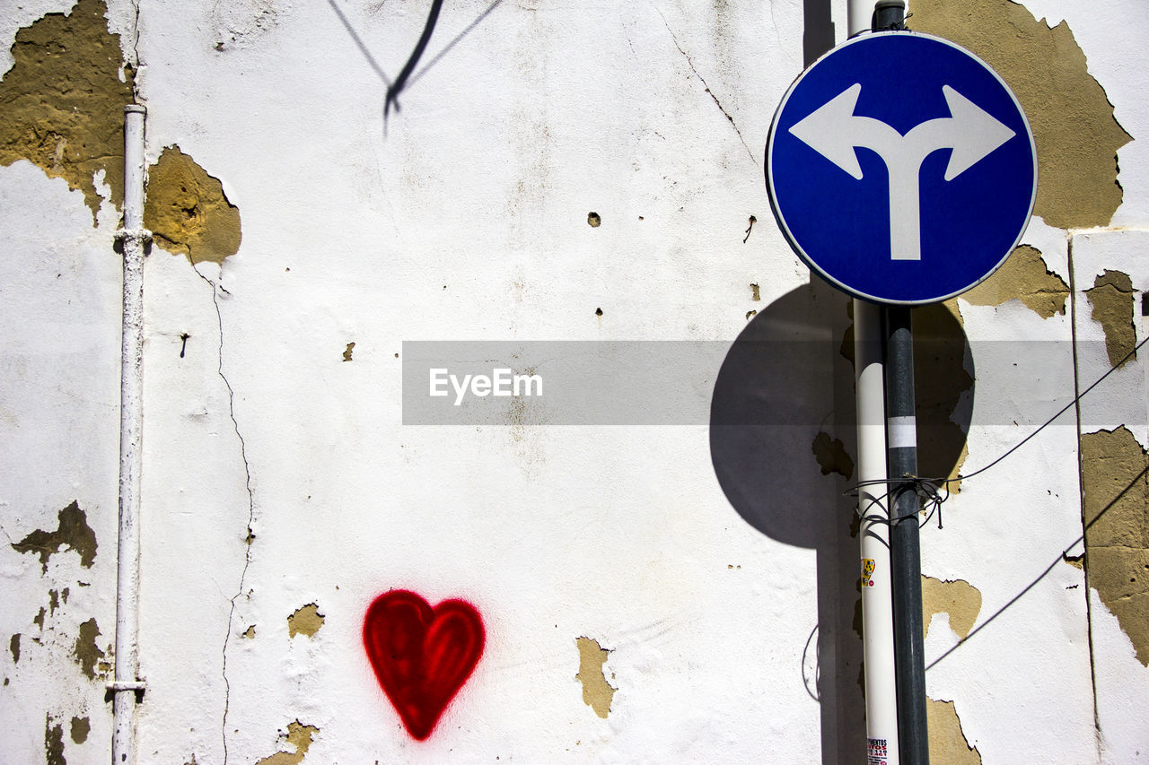 CLOSE-UP OF SIGN ON WALL