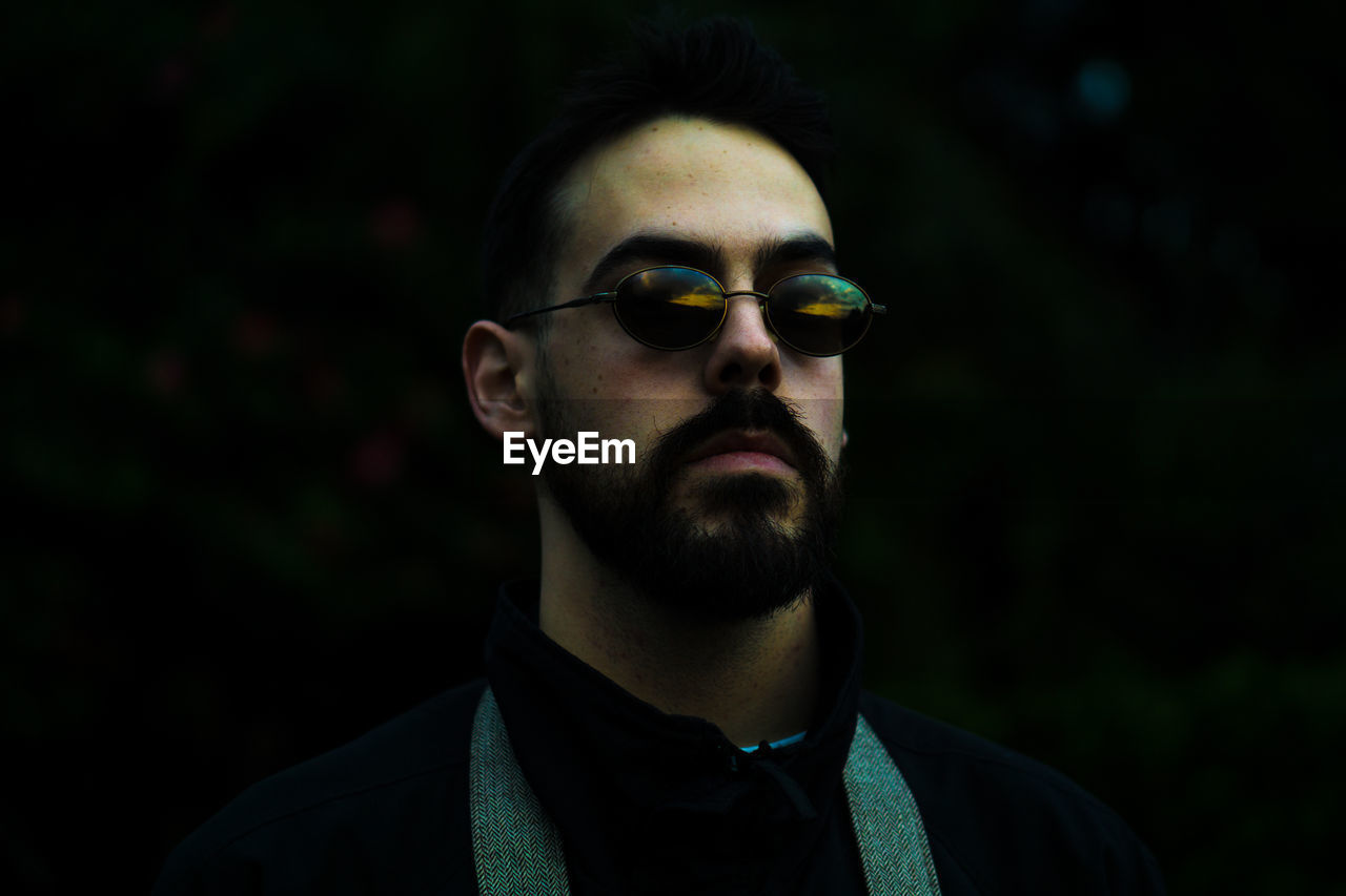 Close-up of young man wearing sunglasses