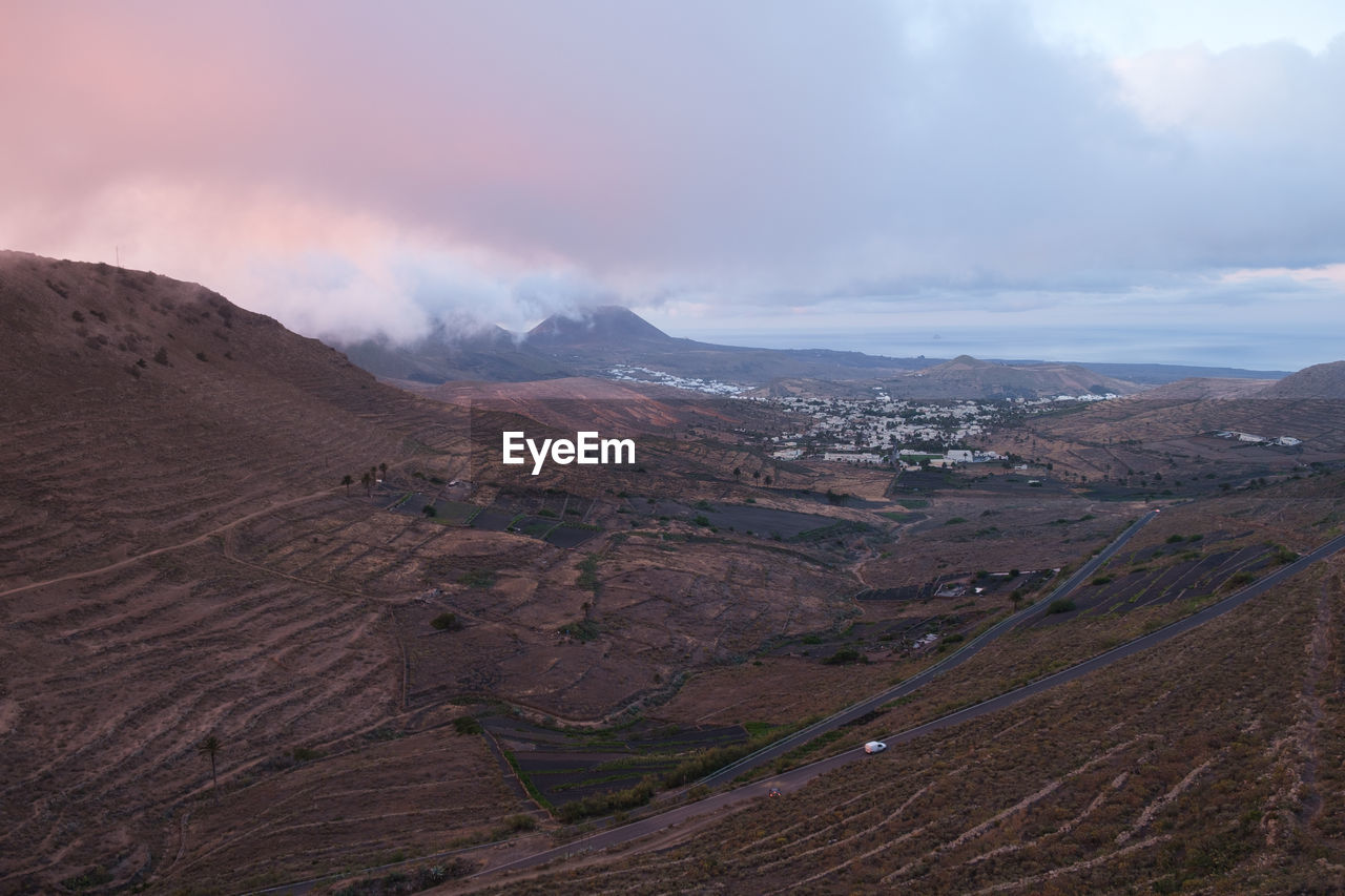 Scenic view of mountains against sky in lanzarote, canary islands