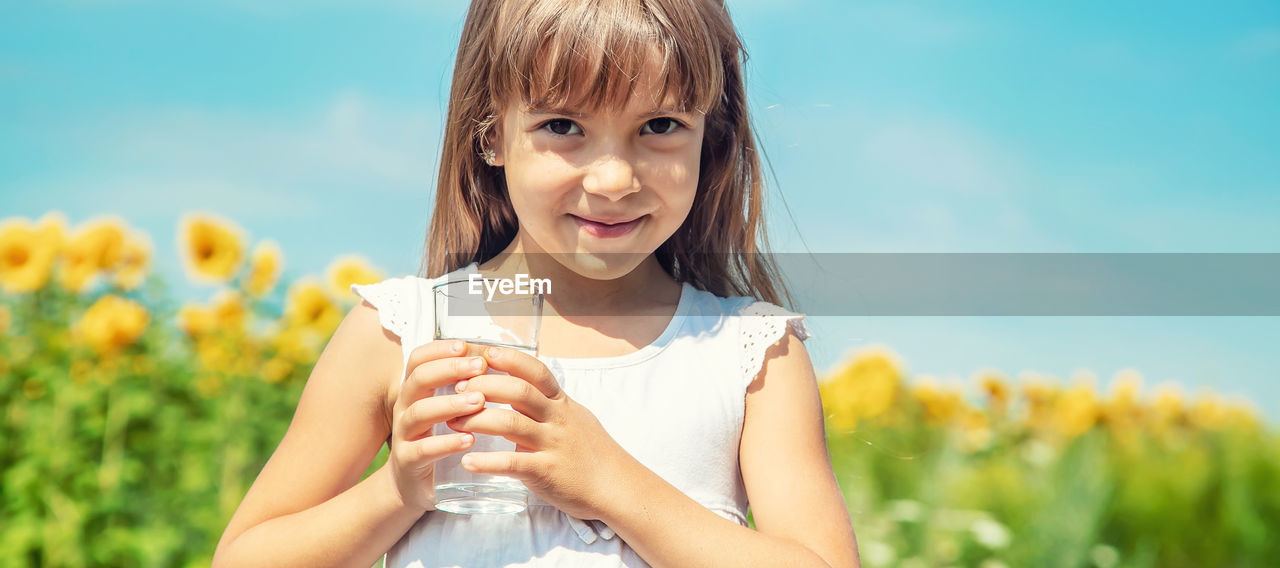 Young woman drinking water