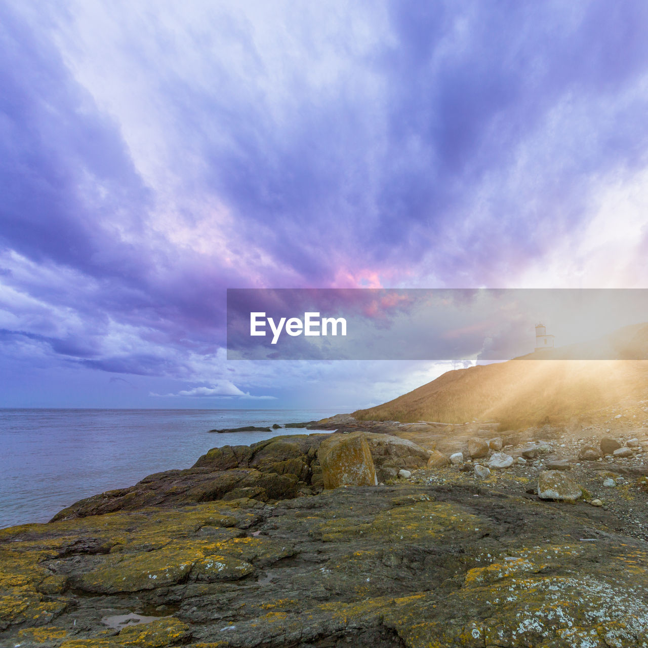 SCENIC VIEW OF SEA AGAINST SUNSET SKY