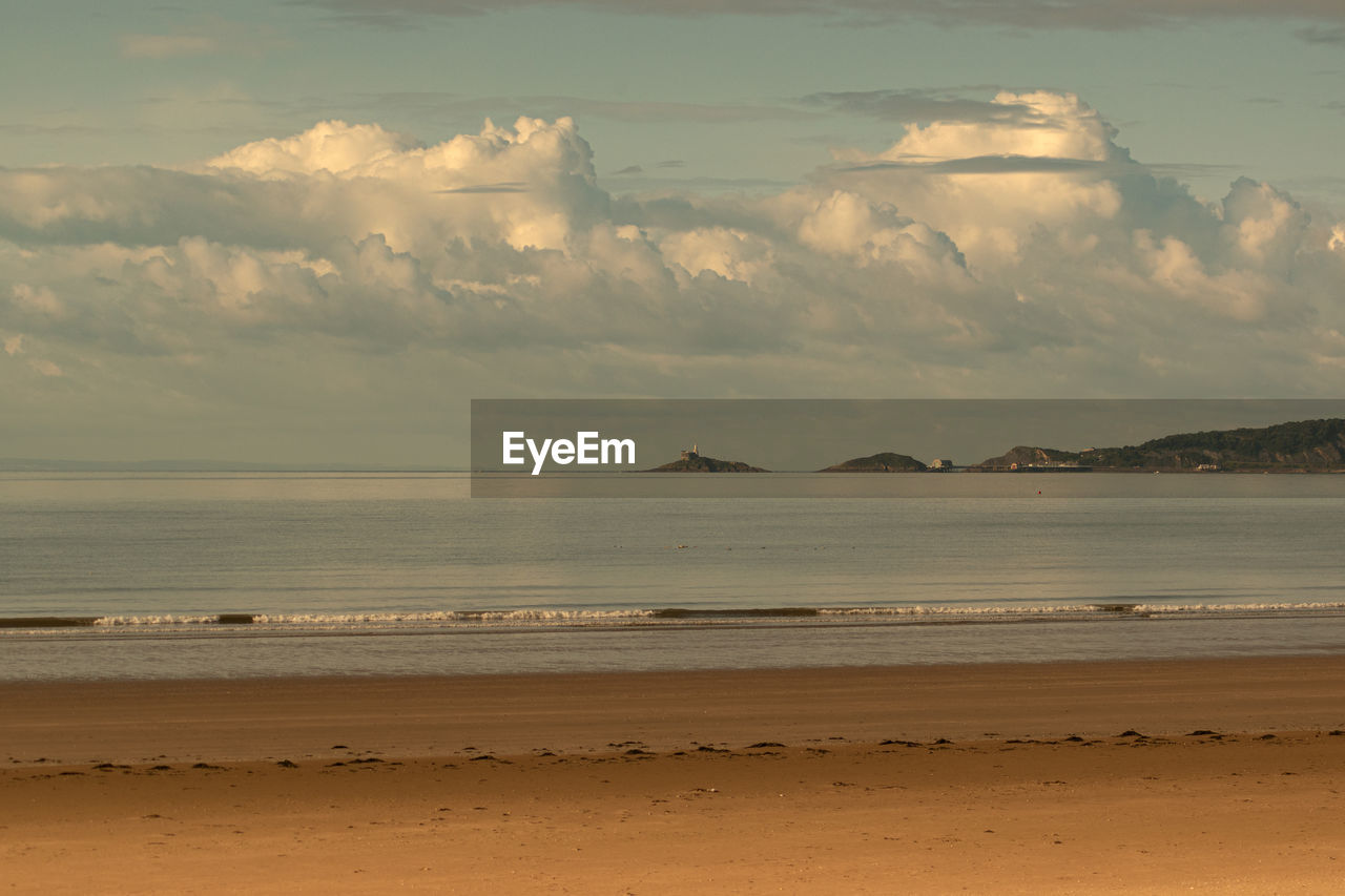 Scenic view of swansea bay against sky