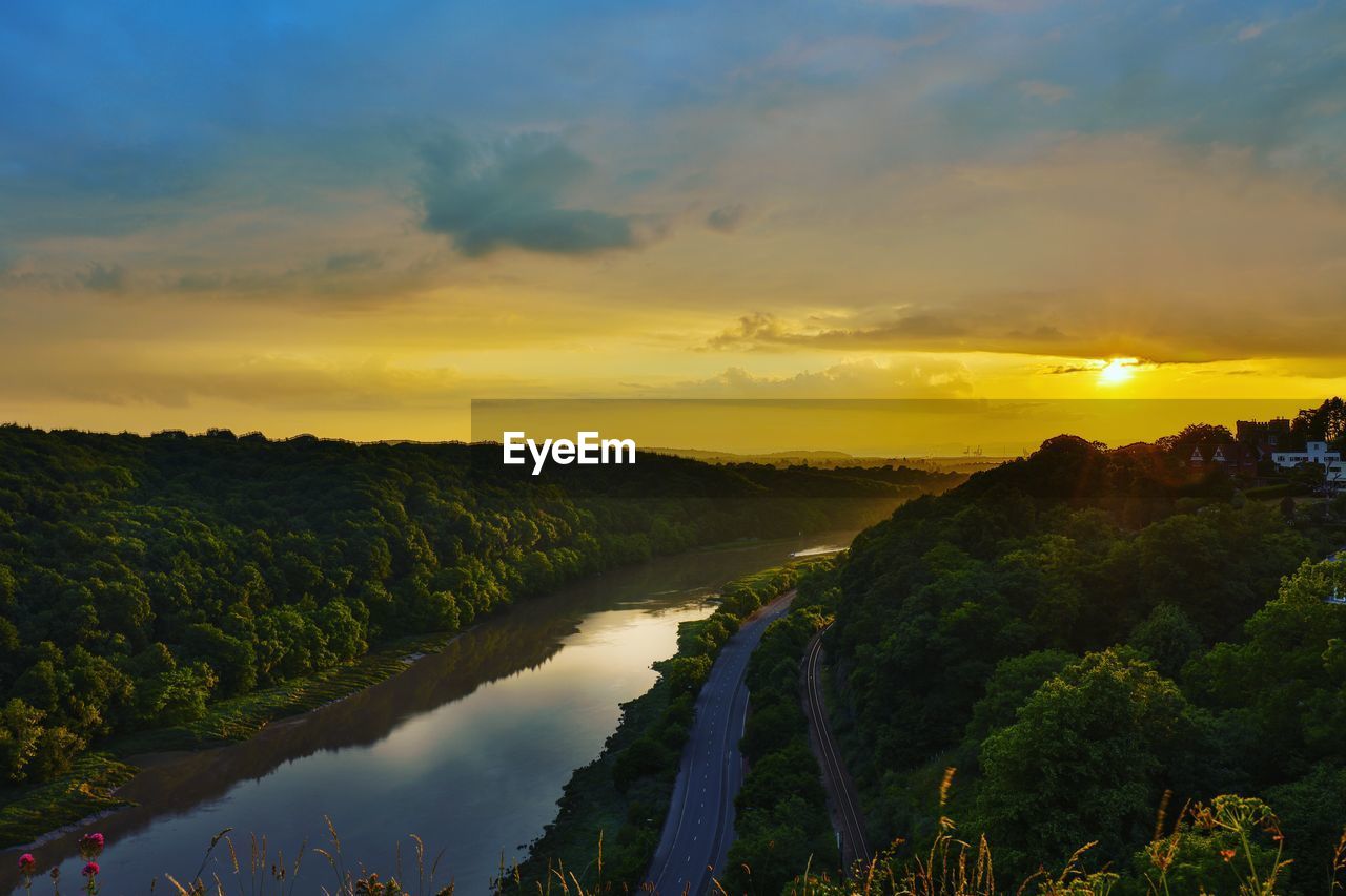 Scenic view of river against sky during sunset in the avonmouth. bristol