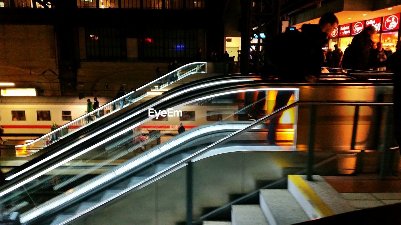 Man on escalator at hamburg hauptbahnhof