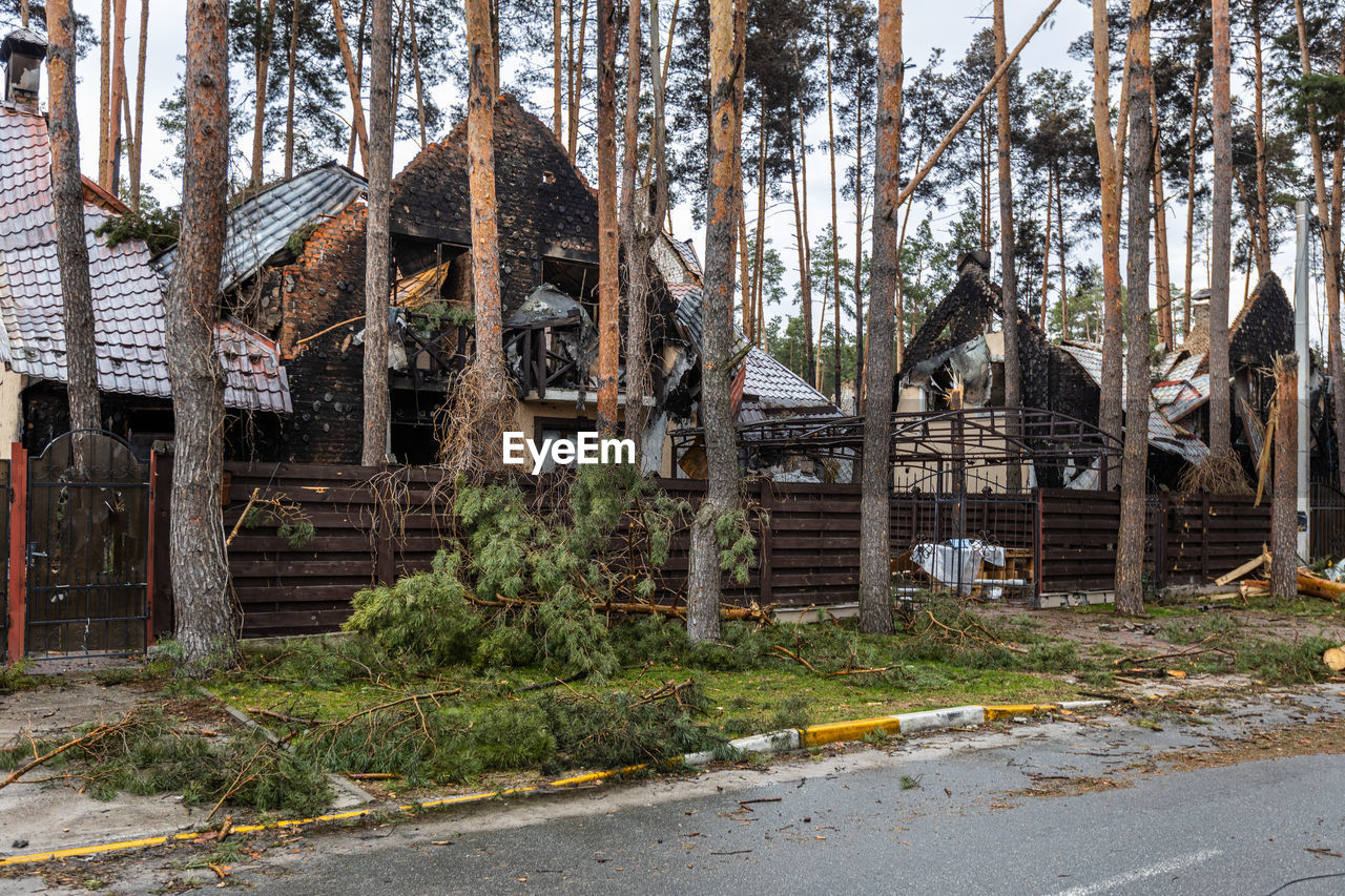 Destroyed buildings on the streets of irpen. broken windows. buildings after being hit by missiles.