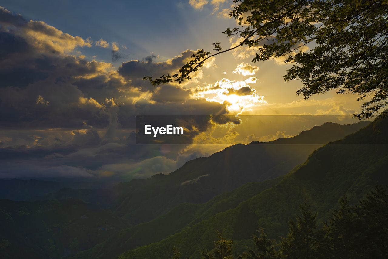 Scenic view of dramatic sky during sunset