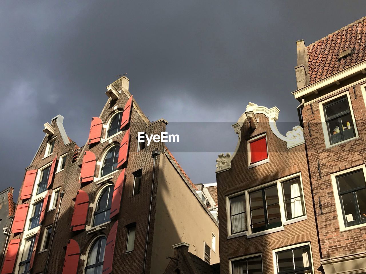 Low angle view of residential buildings against sky