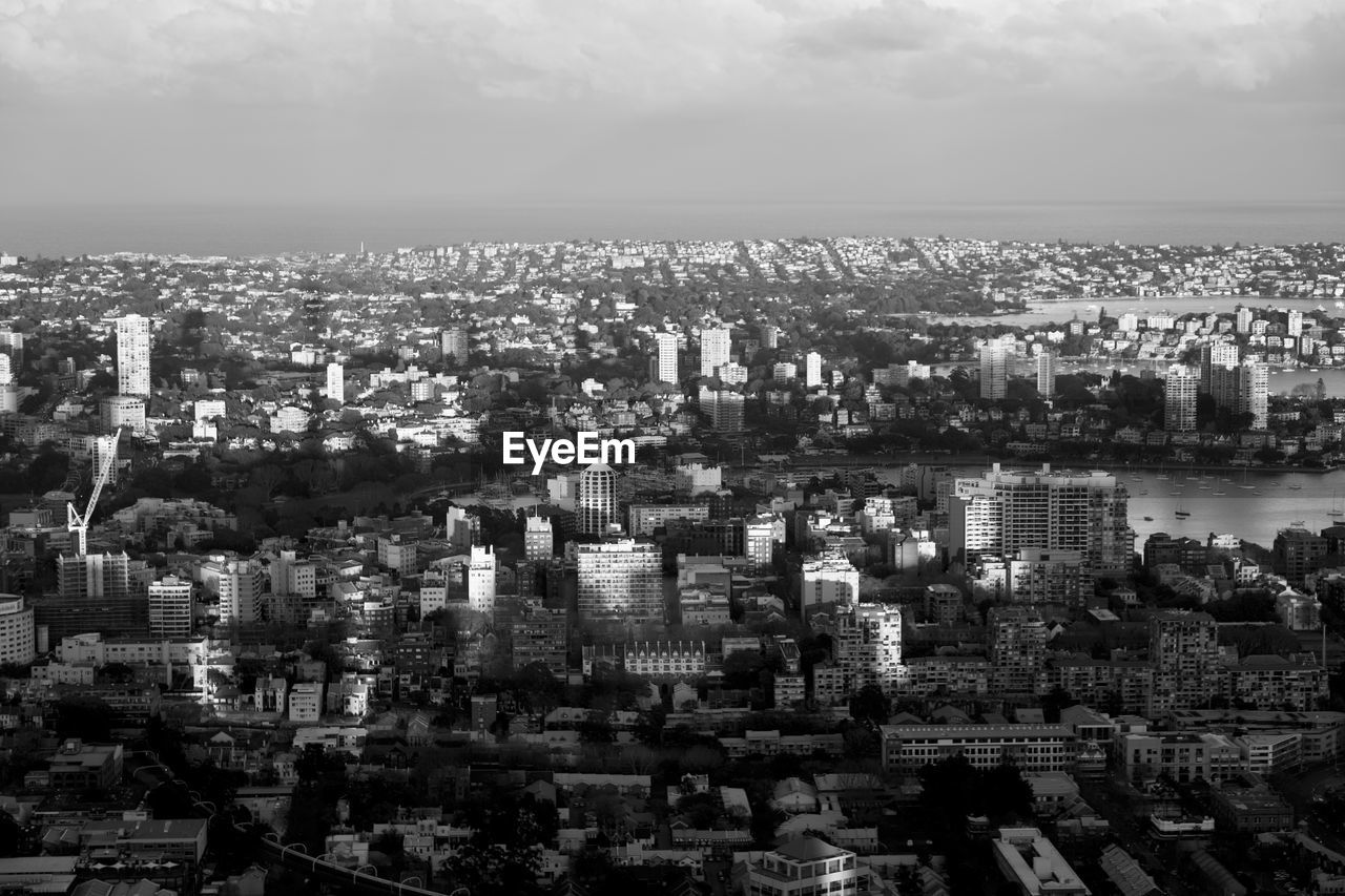 High angle view of buildings against sky in city