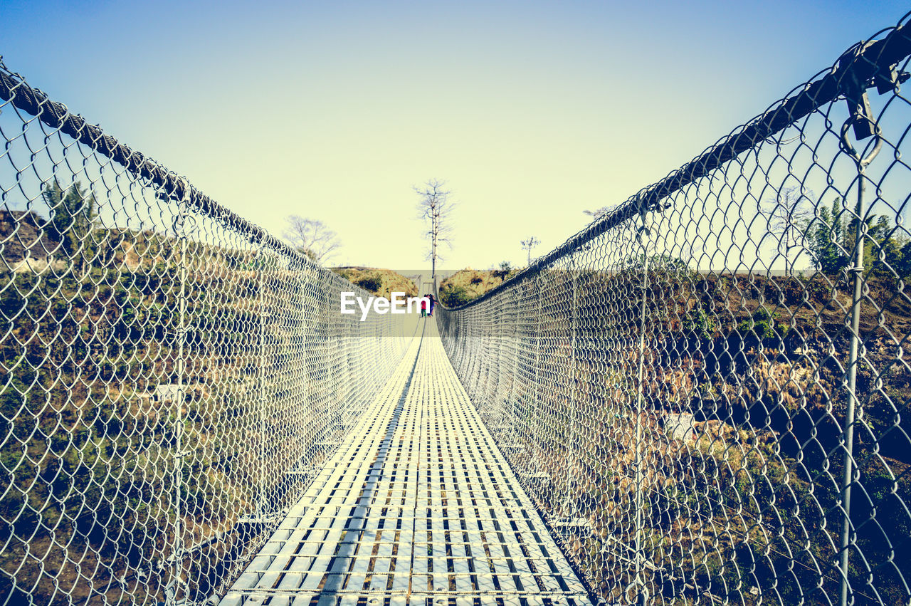 FOOTBRIDGE AGAINST SKY