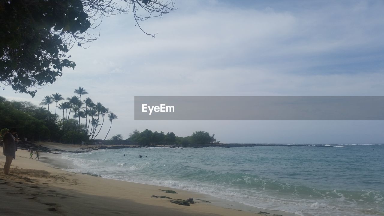 BEACH AGAINST SKY