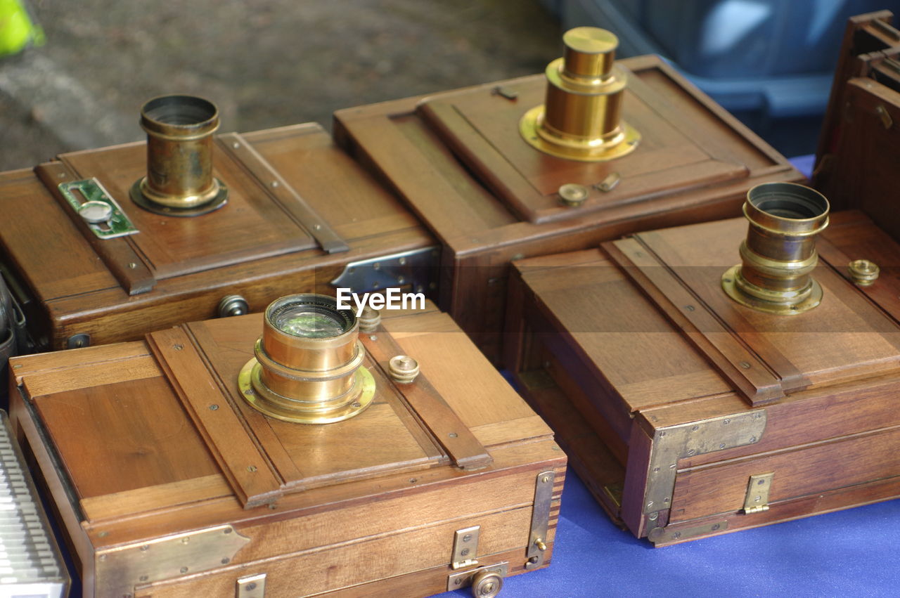 High angle view of vintage cameras on table
