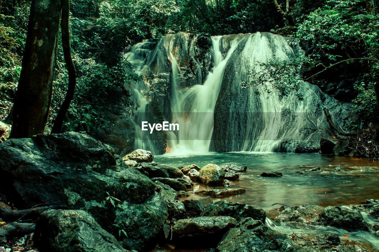 SCENIC VIEW OF WATERFALL