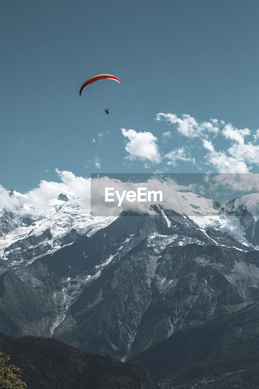 Scenic view of snowcapped mountain against sky