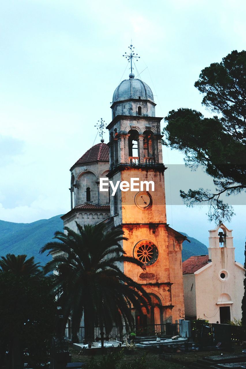 LOW ANGLE VIEW OF CLOCK TOWER