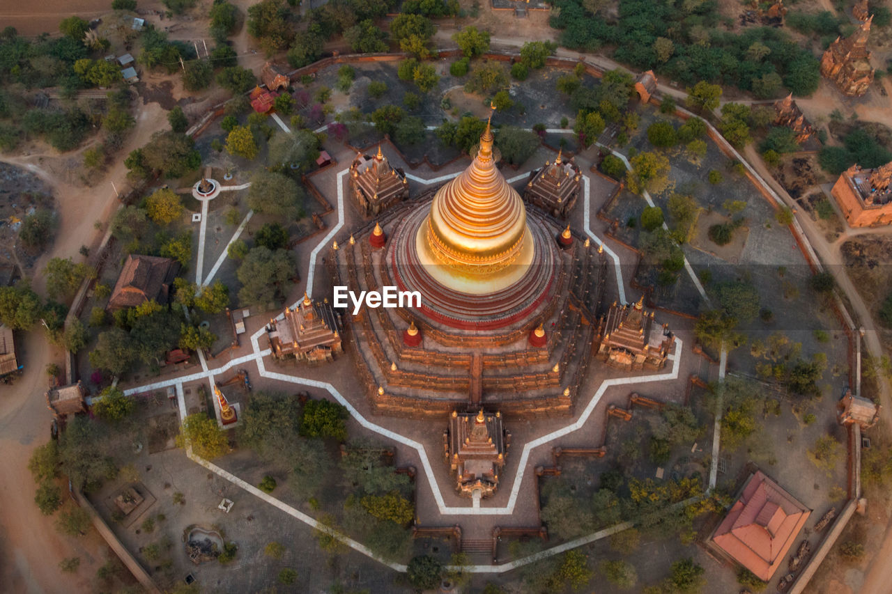 HIGH ANGLE VIEW OF A TEMPLE AGAINST BUILDING