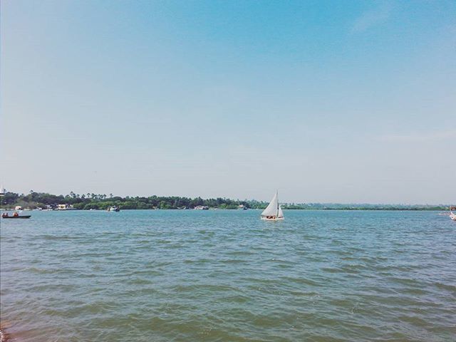 BOATS SAILING IN SEA