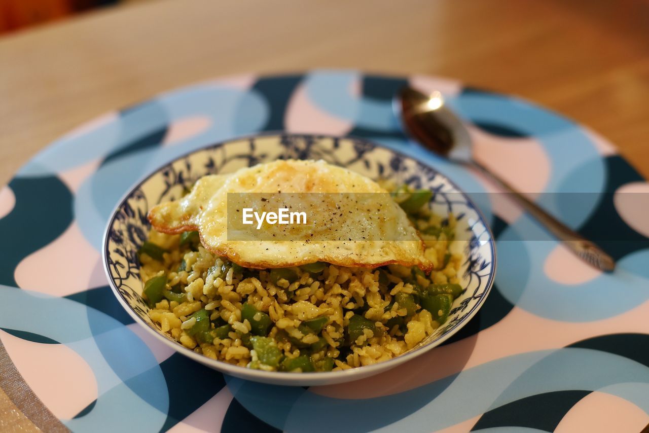 HIGH ANGLE VIEW OF FOOD SERVED IN PLATE