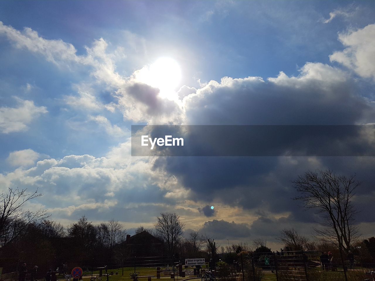 Scenic view of landscape against cloudy sky