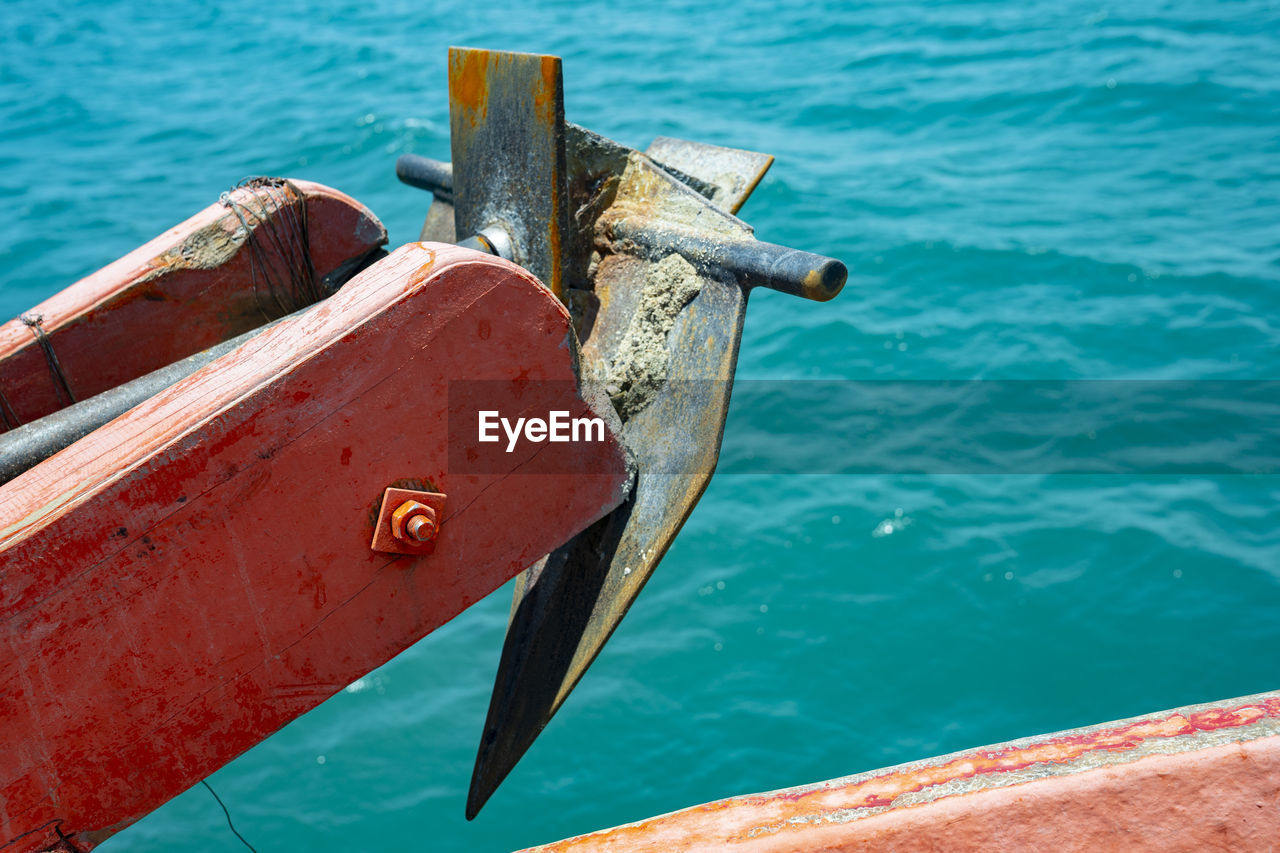 CLOSE-UP OF PADLOCK ON RAILING