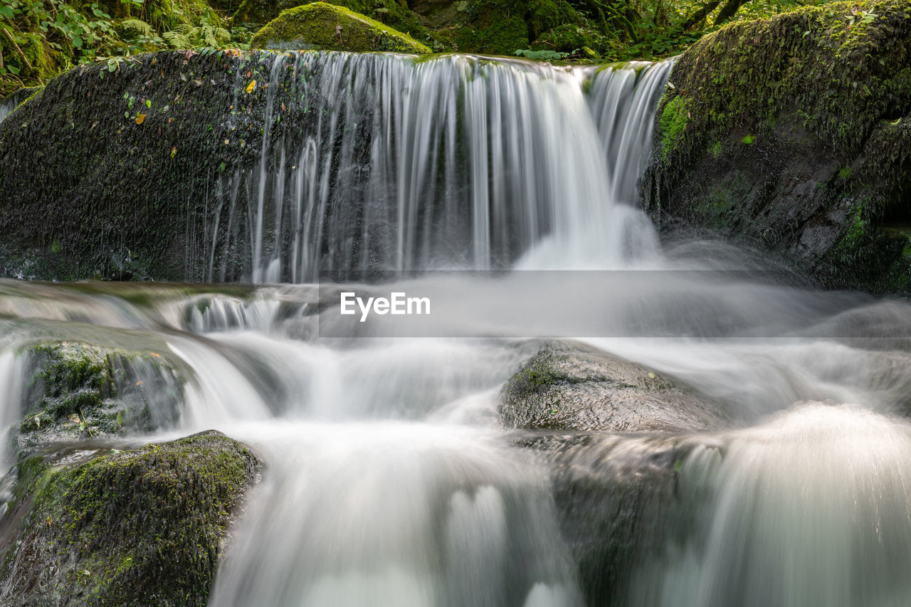 Long exposure of a waterfall on the hoar oak water river flowing through the woods at watersmeet 