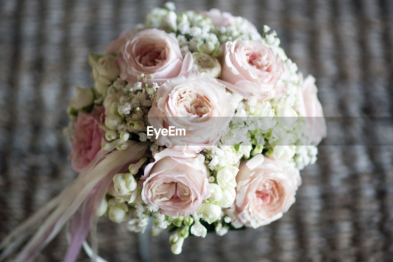 Close-up of rose bouquet during wedding