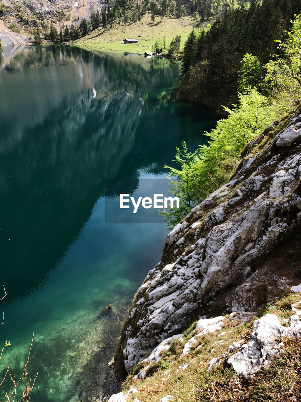 High angle view of lake amidst rocks