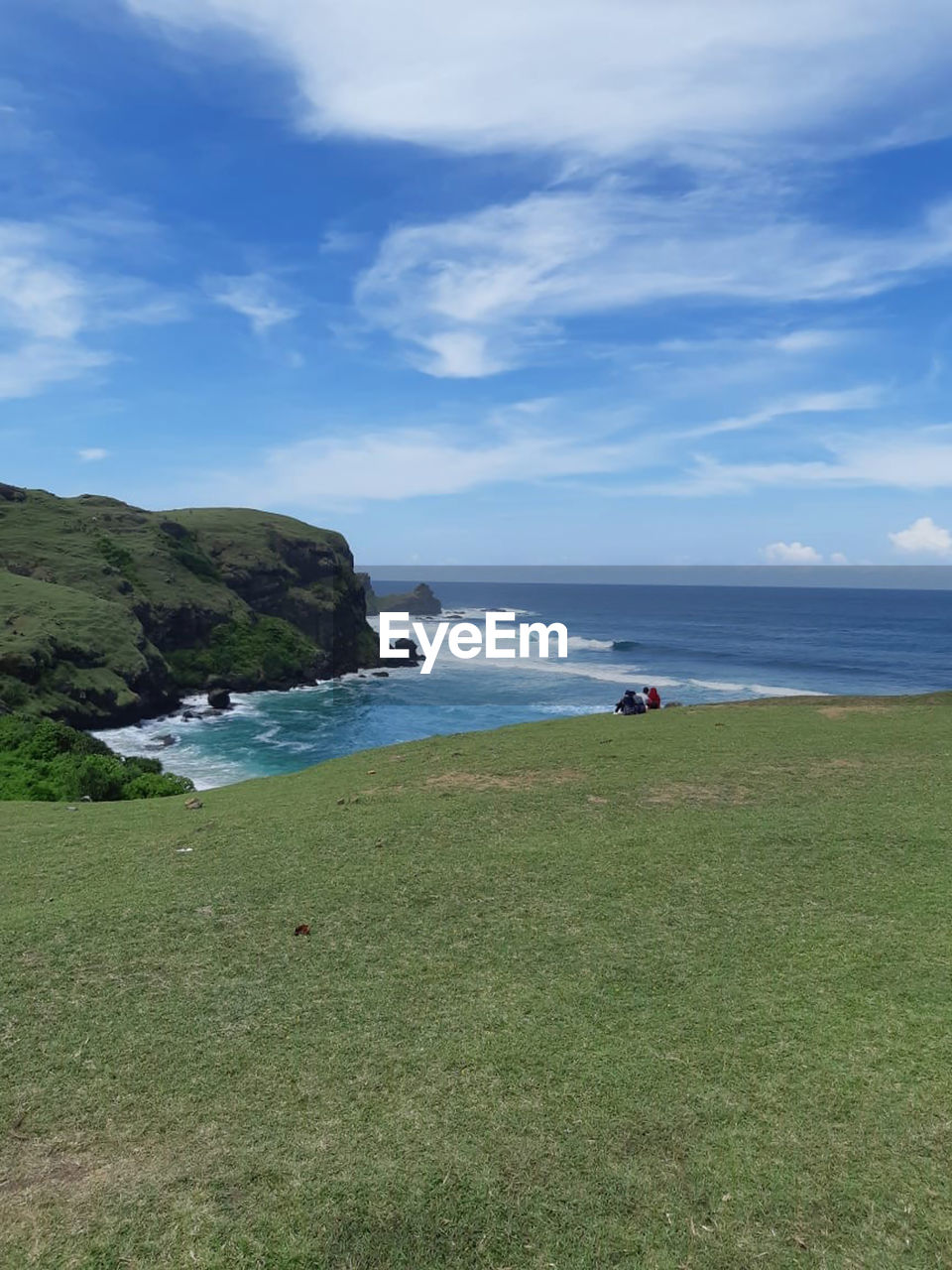 SCENIC VIEW OF SEA AND BEACH AGAINST SKY