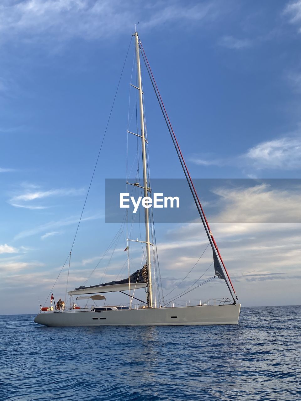 sky, cloud, blue, mast, sailing, nature, transportation, wind, water, nautical vessel, mode of transportation, sailboat, vehicle, day, no people, sea, ship, outdoors, travel, low angle view, windsports, sports, boat