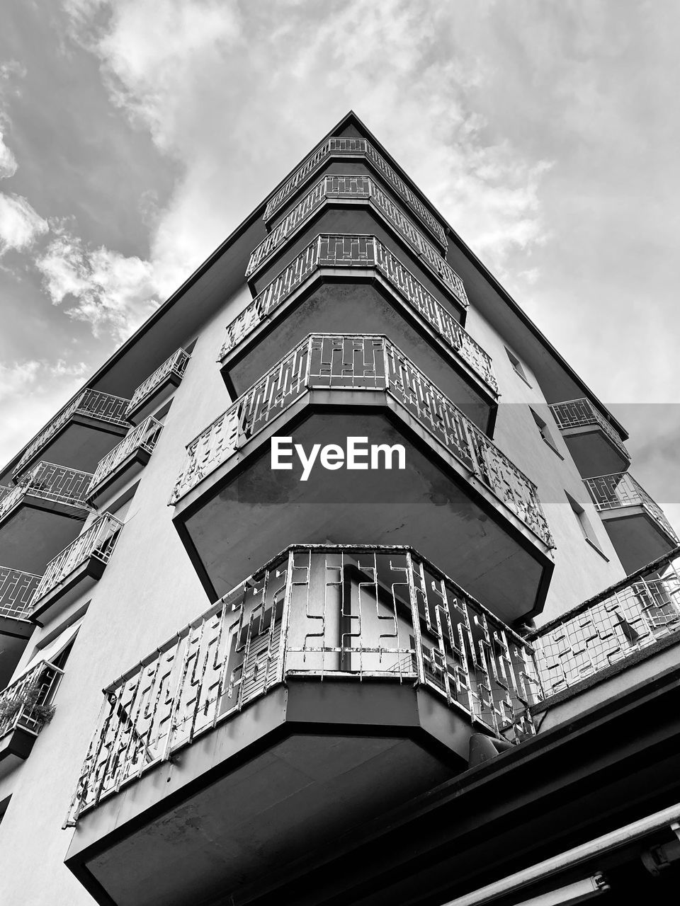 architecture, black and white, built structure, building exterior, monochrome photography, monochrome, low angle view, white, sky, no people, cloud, house, building, black, landmark, city, nature, day, facade, outdoors, window