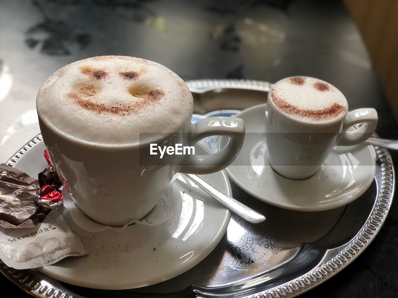 CLOSE-UP OF COFFEE SERVED ON TABLE AT HOME