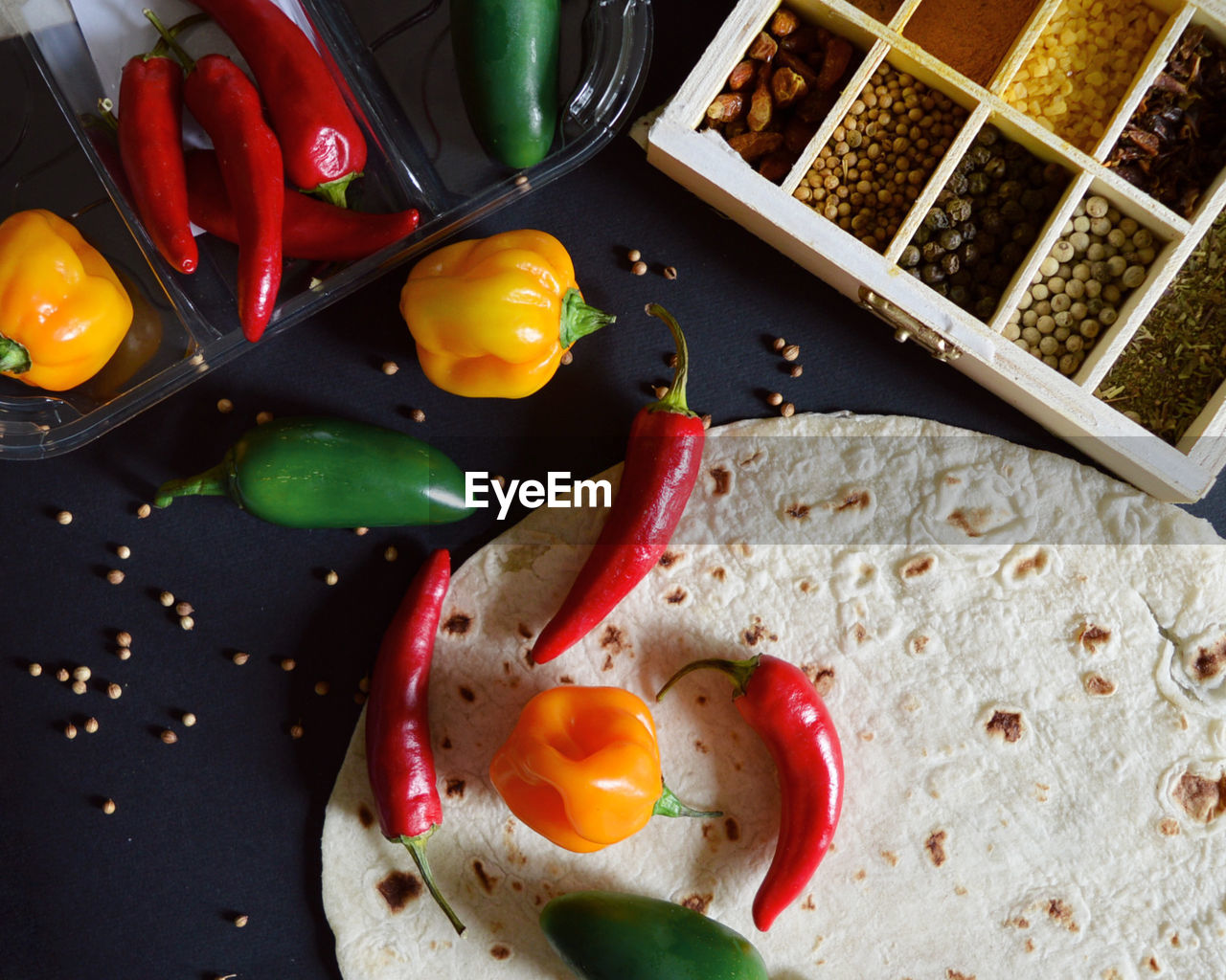 High angle view of hot peppers and spices