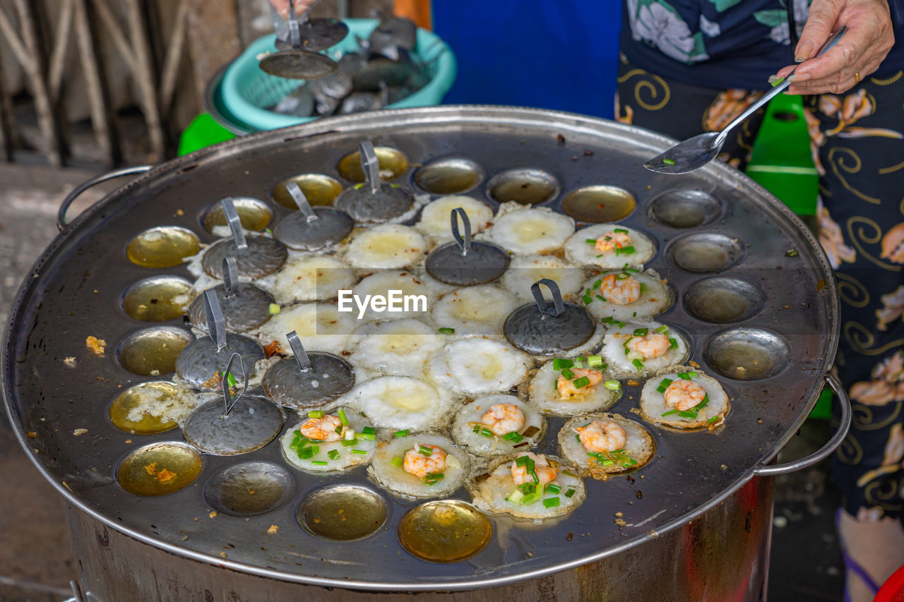 cropped image of man preparing food