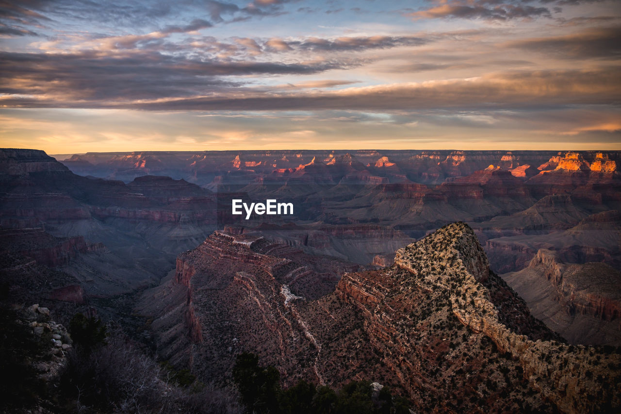 Scenic view of mountains against sky during sunset