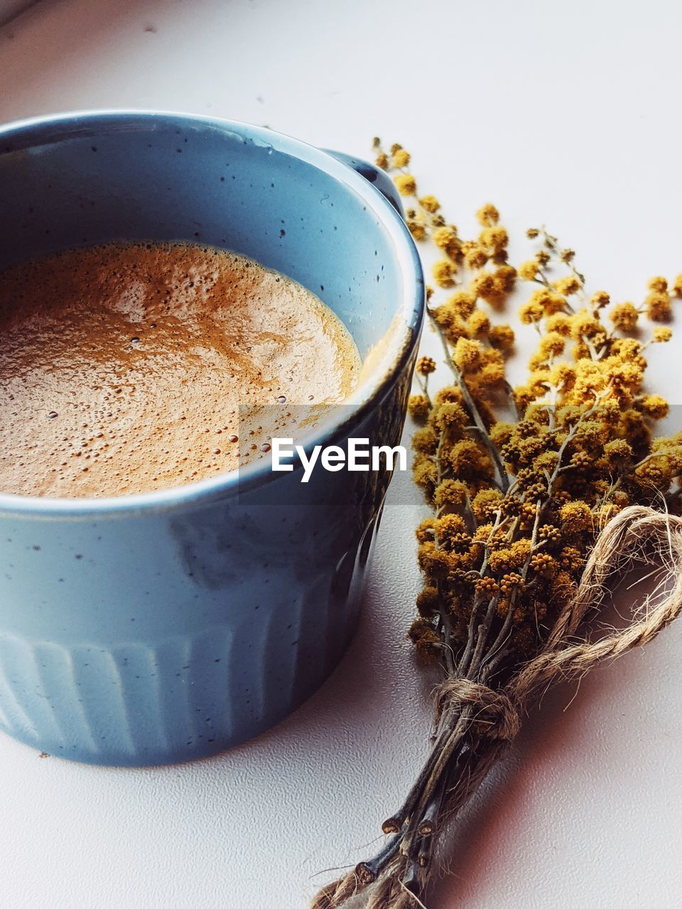 CLOSE-UP OF COFFEE ON TABLE