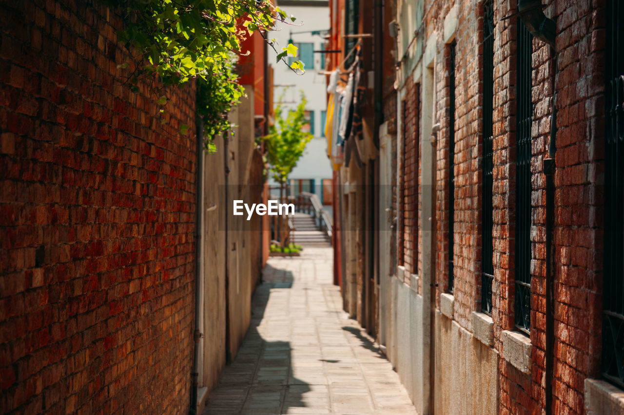 Narrow alley along buildings