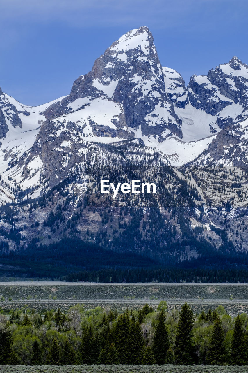 SCENIC VIEW OF SNOWCAPPED MOUNTAIN RANGE AGAINST SKY