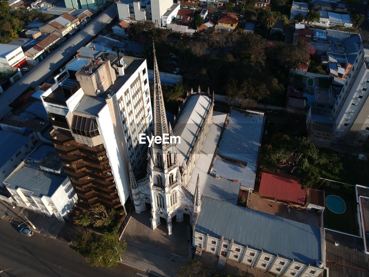 High angle view of street amidst buildings in town