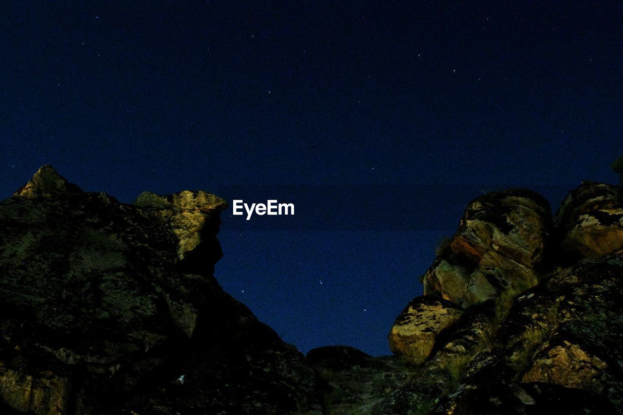 Low angle view of blue sky at night