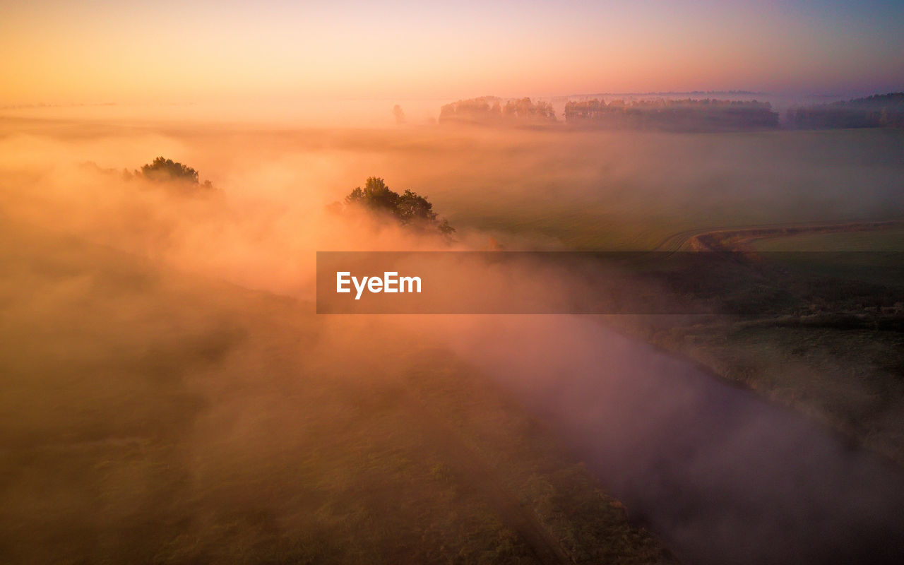 High angle view of landscape against sky during sunset