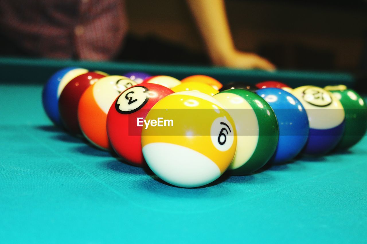 Close-up of multi colored balls on table