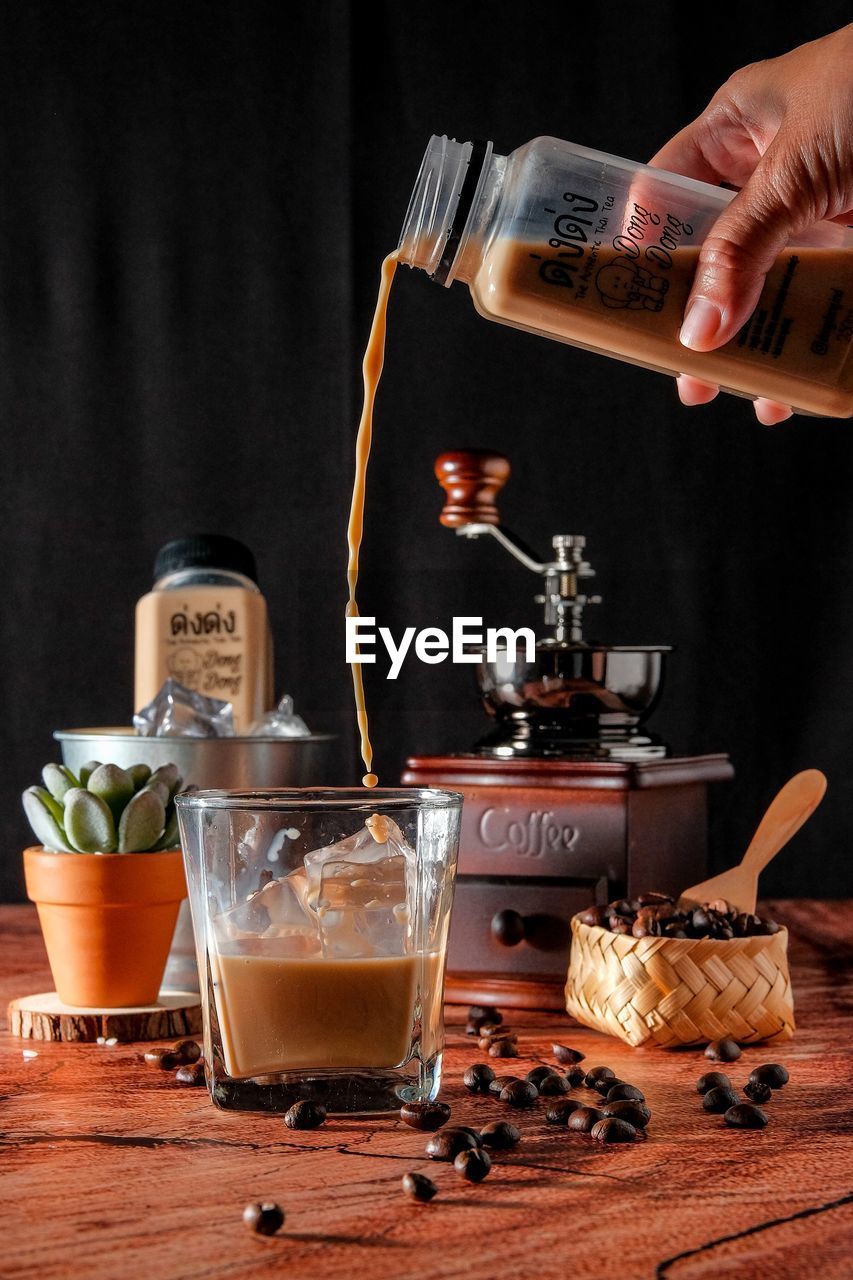 CLOSE-UP OF FOOD ON TABLE AGAINST WALL