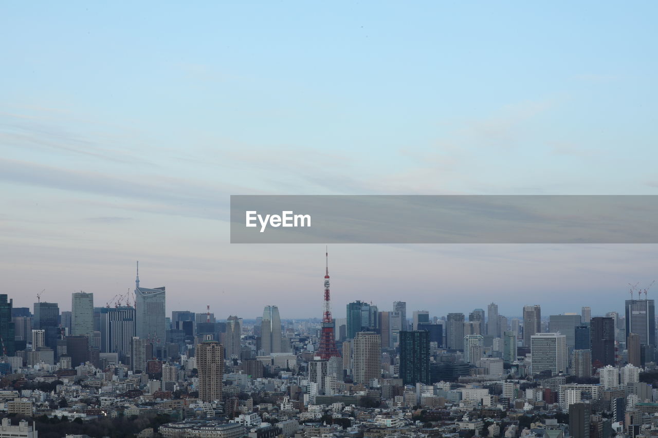 MODERN BUILDINGS IN CITY AGAINST SKY