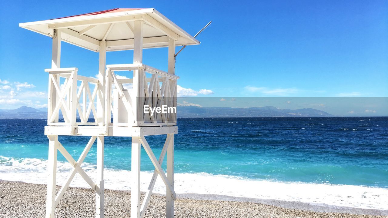 GAZEBO ON BEACH AGAINST SKY