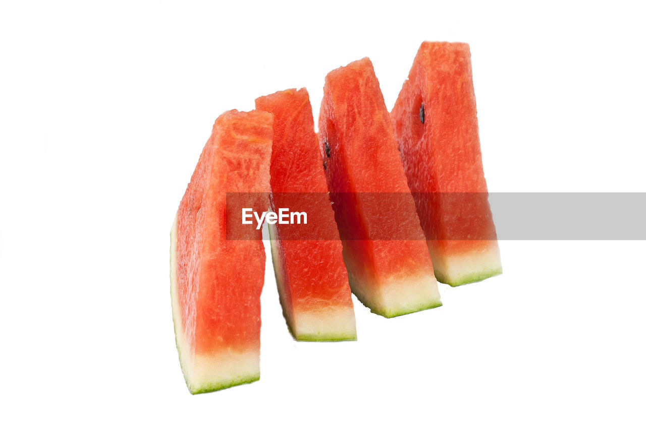 Close-up of watermelon against white background