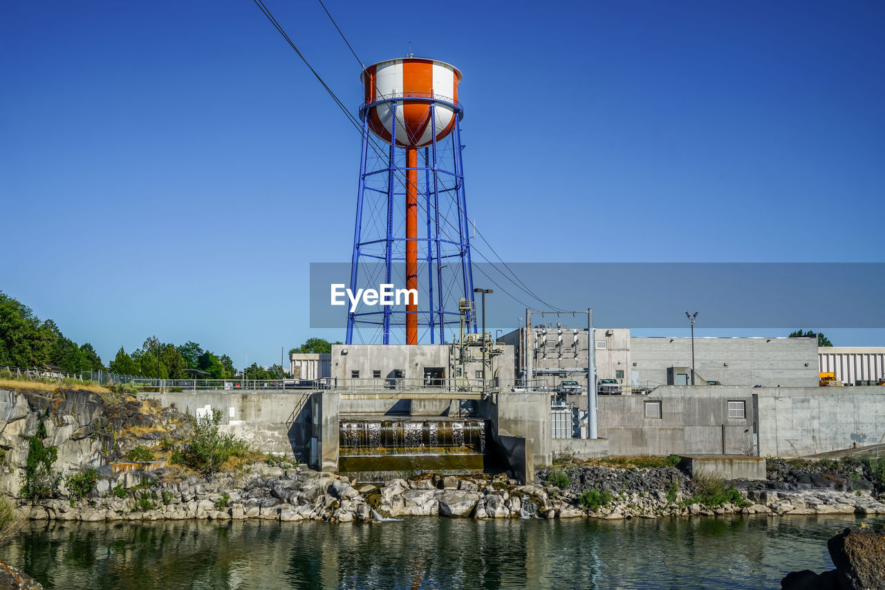 WATER TOWER AGAINST BLUE SKY