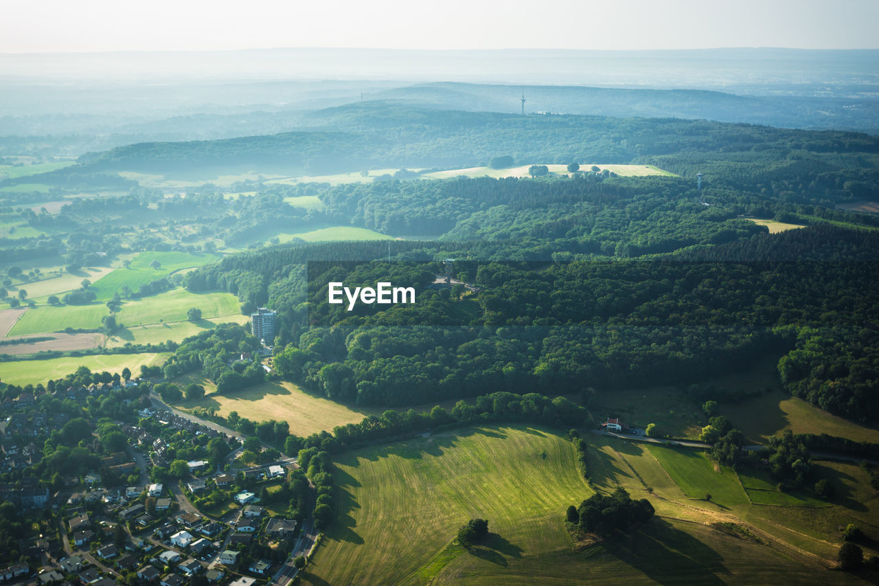 HIGH ANGLE VIEW OF AGRICULTURAL LANDSCAPE