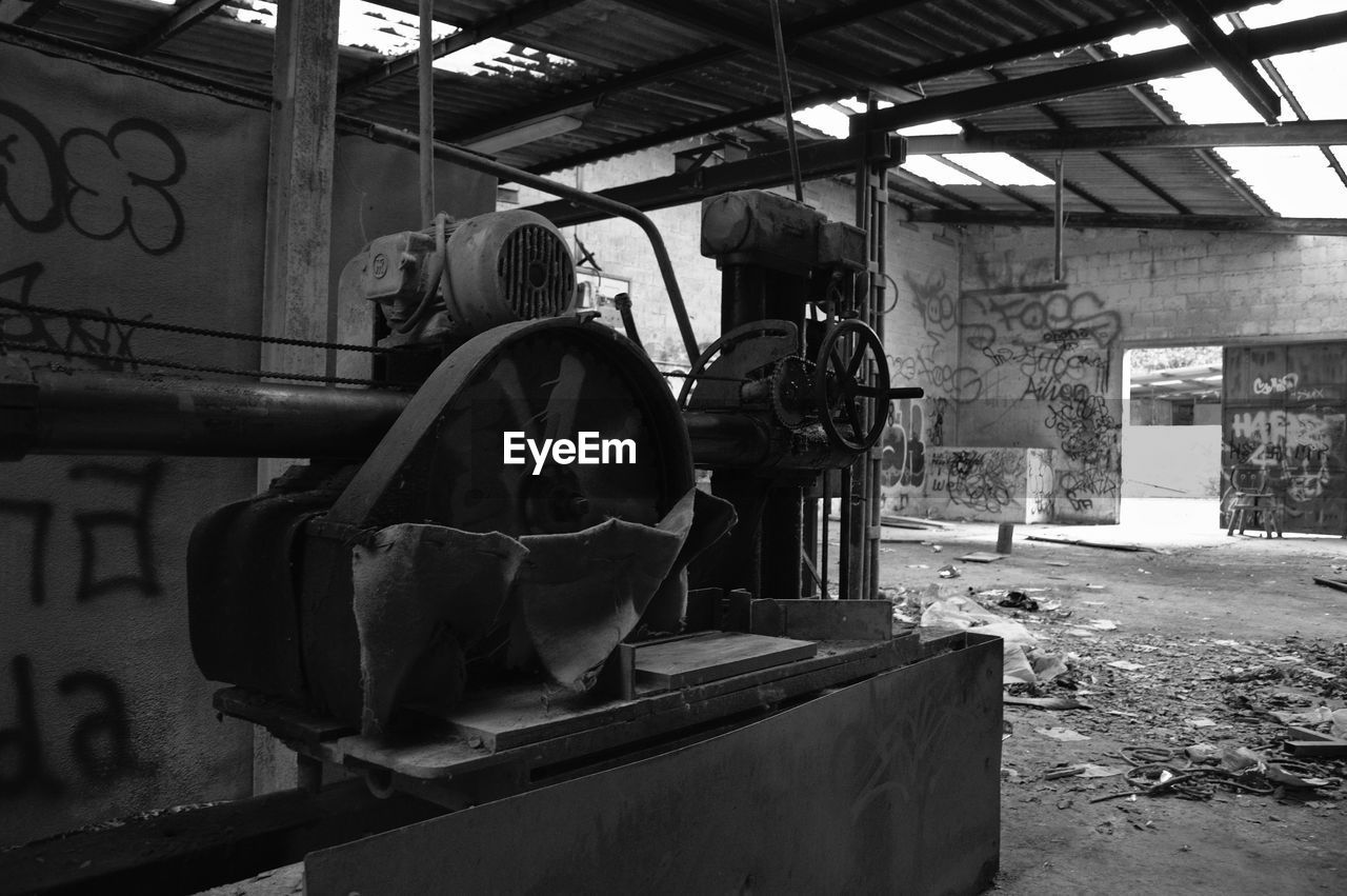 Damaged machinery in abandoned factory