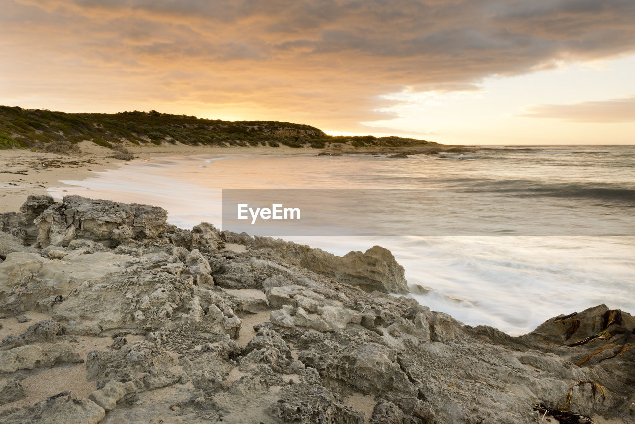 Scenic view of sea against sky during sunset