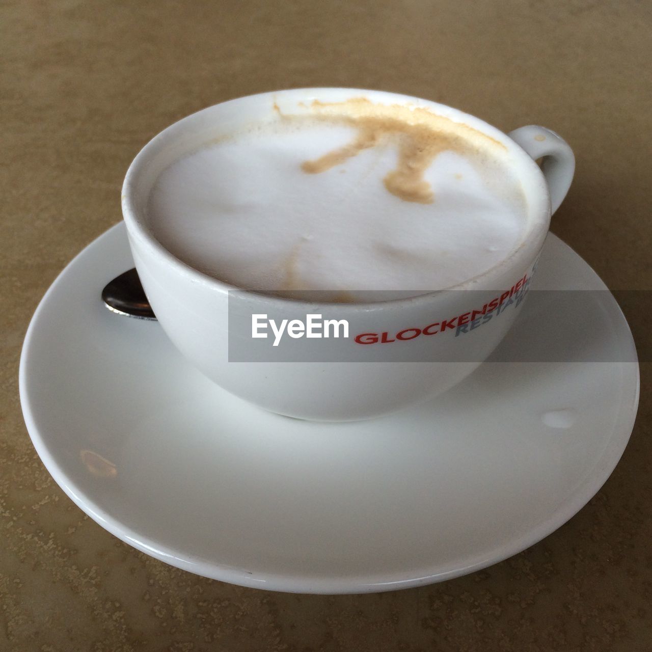 CLOSE-UP OF COFFEE CUP WITH COFFEE CUP