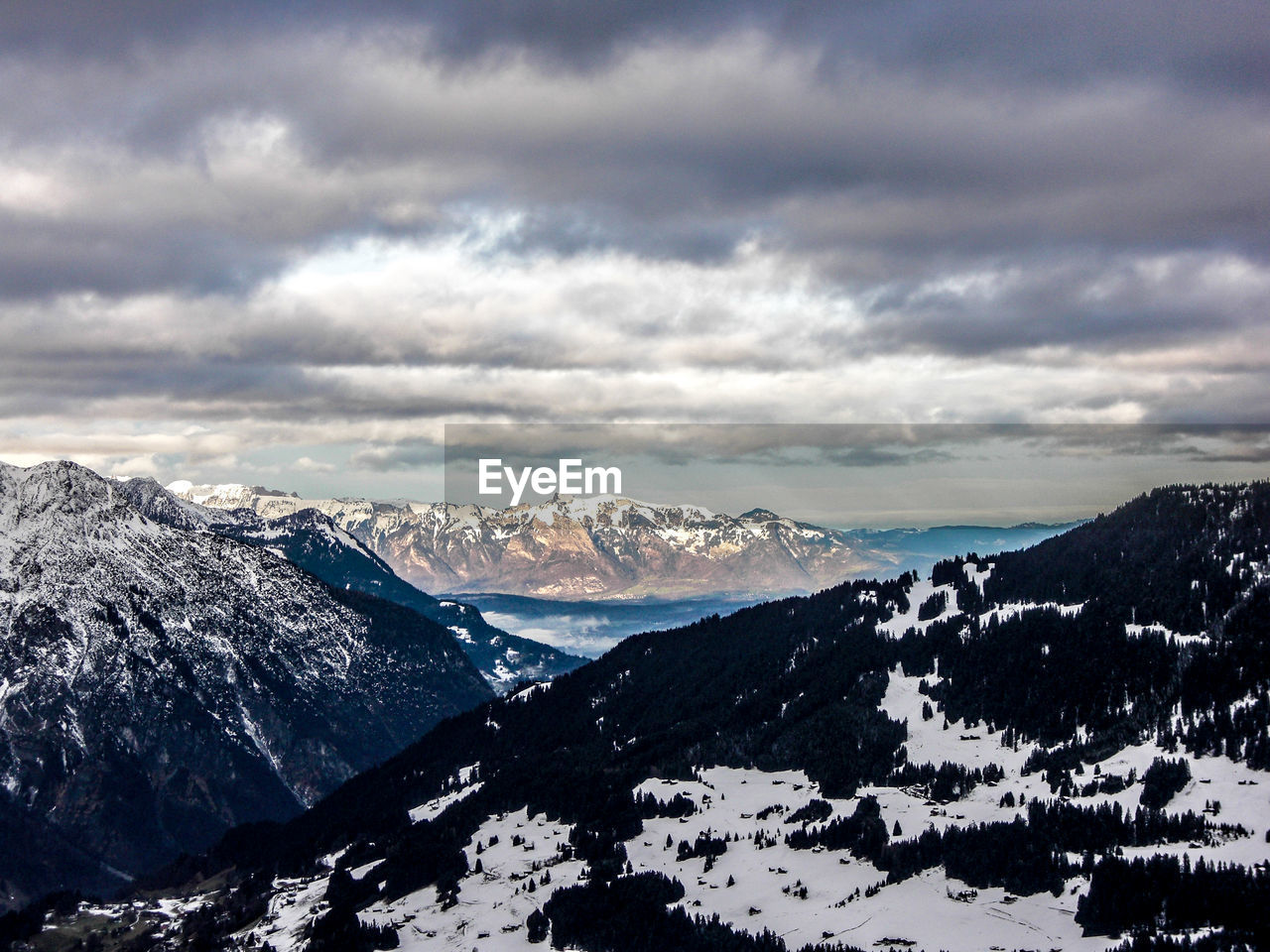 High angle shot of snow covered mountains
